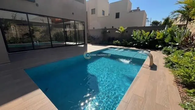 Sobrado com 4 dormitórios à venda, 447 m² por R$ 4.500.000,00 - Condomínio Buganvile - Ribeirão Preto/SP